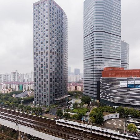 ニュー スペース タイム ヂョンリー ホテル アパートメント 上海市 エクステリア 写真